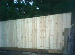 Close-board fencing around a garden