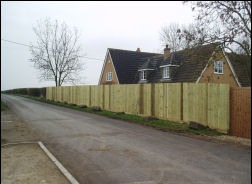 A tall close-board fence