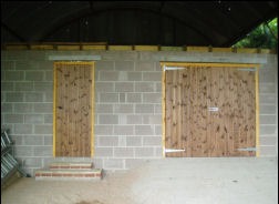 A timber door in a stone wall