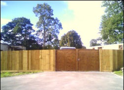 A pair of close-boarded drive gates