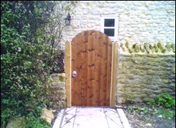 A timber door in a block opening