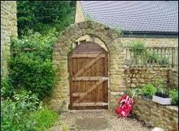 An arched ledged door
