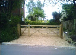 A curved-heel entrance gate