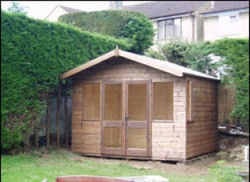 A small 7 by 5 summer house with glazed doors